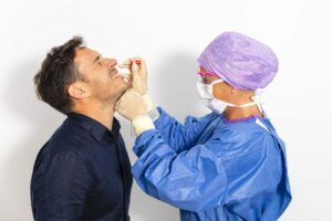 Doctor taking a nasal swab test