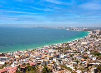 Puerto Vallarta one of Top 15 International Destinations for LGBTQ+ on AirBNB Scenic viewpoint Cerro La Cruz Viewpoint with panoramic views of Puerto Vallarta and the famous coastline with ocean beaches and luxury hotels.