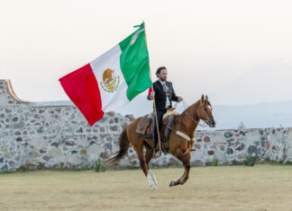 Mexican Independence Day Arrives As City Celebrates Charro with Mexican Flag
