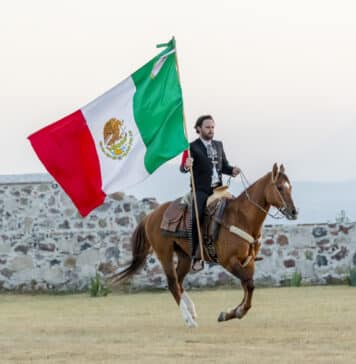 Mexican Independence Day Arrives As City Celebrates Charro with Mexican Flag