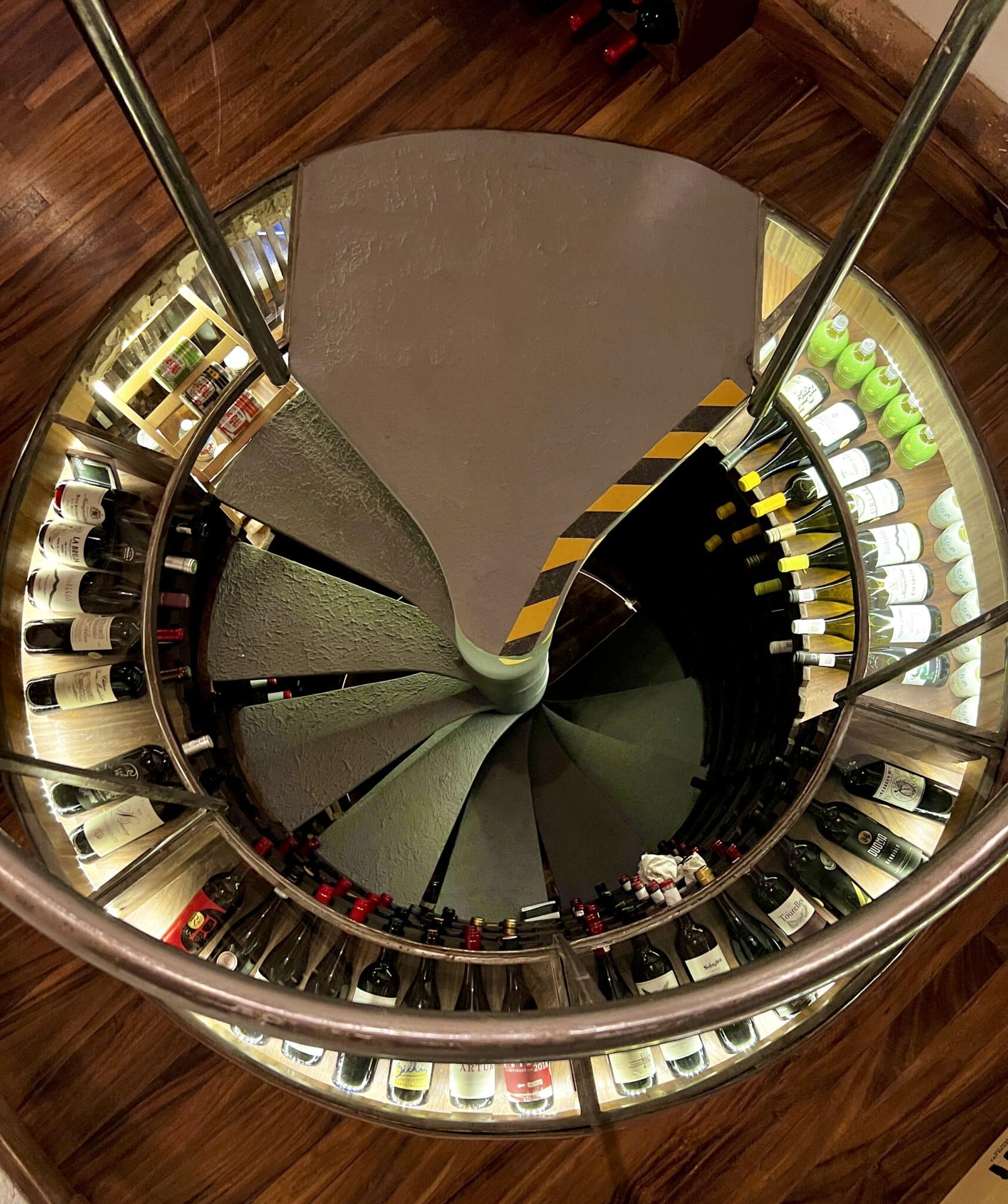 A custom built wine cellar kept at certain temperatures for the wine and sake.