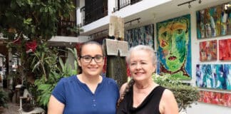 (left to right) Gena Guarniere and Claire Guarniere, owners of Di Vino Dante Tapas and Wine and ​Galleria Dante . Photo by Oscar Almeida.