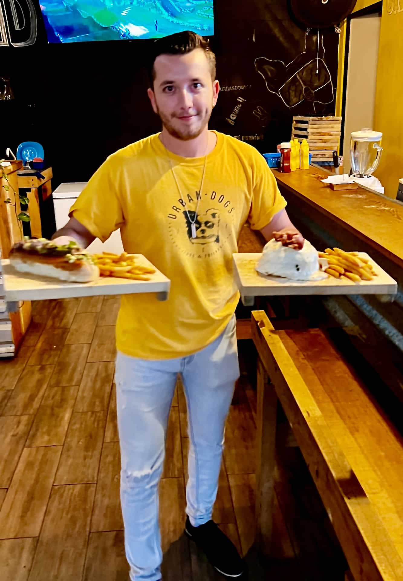 Owner Christopher Montoya serving up at Urban Dogs. Photo by Jerry Jones
