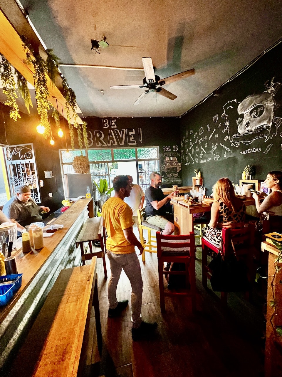 You'll find the interior of Urban Dogs small but cozy. Photo by Jerry Jones