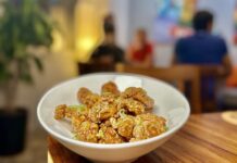 Experience Award-Winning Cantonese Cuisine at Canto Orange Chicken at Canto. Photo by Oscar Almeida.