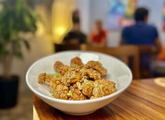 Experience Award-Winning Cantonese Cuisine at Canto Orange Chicken at Canto. Photo by Oscar Almeida.
