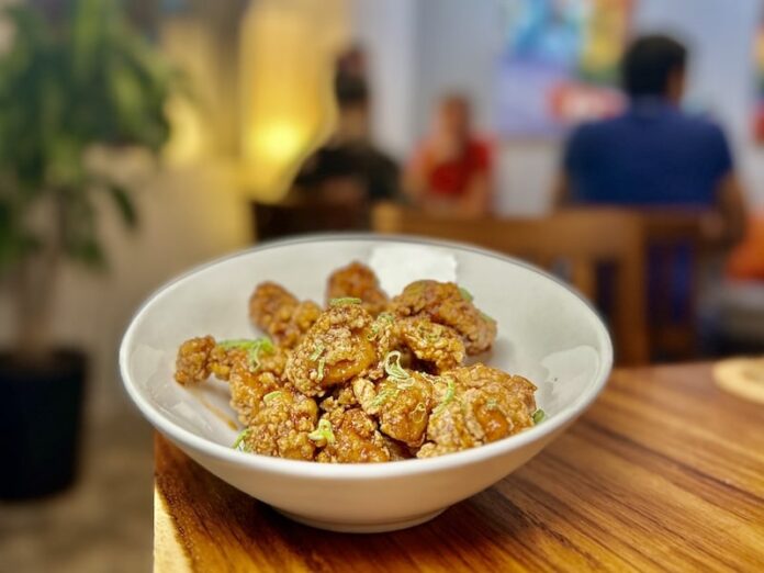 Orange Chicken at Canto. Photo by Oscar Almeida.