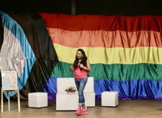 Strengthening Community: Te Cuido, Me Cuido 2024, A Free Health Initiative Activist Kenya Cuevas at conference for Vallarta Pride 2024 by photographer Oscar Almeida