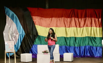Strengthening Community: Te Cuido, Me Cuido 2024, A Free Health Initiative Activist Kenya Cuevas at conference for Vallarta Pride 2024 by photographer Oscar Almeida