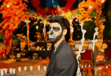 Recuérdame Festival Celebrates Dia De Los Muertos Benjamin Leonardo, with makeup by Debora Chacales, prepares for the Day of the Dead celebration. Photo by Oscar Almeida.