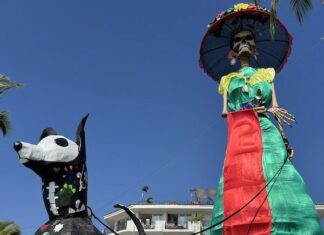 Day of the Dead Celebrations Draw Big Crowds to Puerto Vallarta The world's tallest Catrina and her dog in the 2024 Puerto Vallarta Day of the Dead celebration.