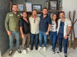 Vallarta Pride 2025 Gains Official Support from Vallarta Government (left to right) Director of Commercial and Service Liaison Luis Tello; Director of Operations Alfredo Soria; Vallarta Pride Organizing Committee President Javier Jiménez; Puerto Vallarta Mayor Luis Munguía; Deputy and City Councilwoman Melissa Madero; and Director of Public Relations Carlos Plascencia. Photo provided.