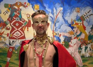 Felix d'Eon. Posing in front of the amazing art created as Chicome Itzcuintli Amatlapalli..jpeg