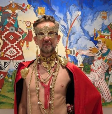 Arte Vallarta Unveils Exhibitions of d’Eon, Amatlapalli, and Jones Felix d'Eon. Posing in front of the amazing art created as Chicome Itzcuintli Amatlapalli..jpeg