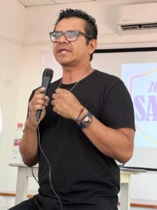Poncho Davalos, a key figure in the program’s development and presentation, talks during the program launch. Photo by Jerry Jones