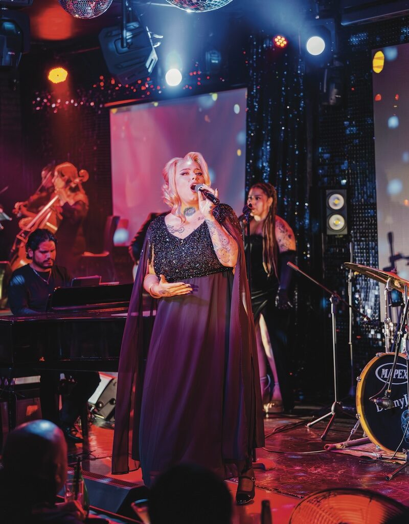 Gloria Fiona as Adele.