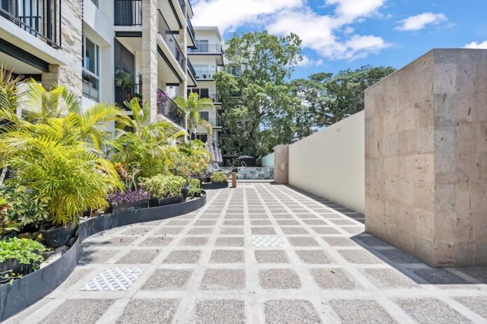 Entrance of a developement named Palm Springs in Puerto Vallarta by Poncho Davalos Real Estate