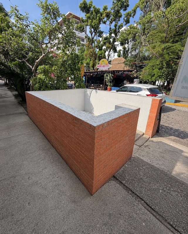 brick trash containment area